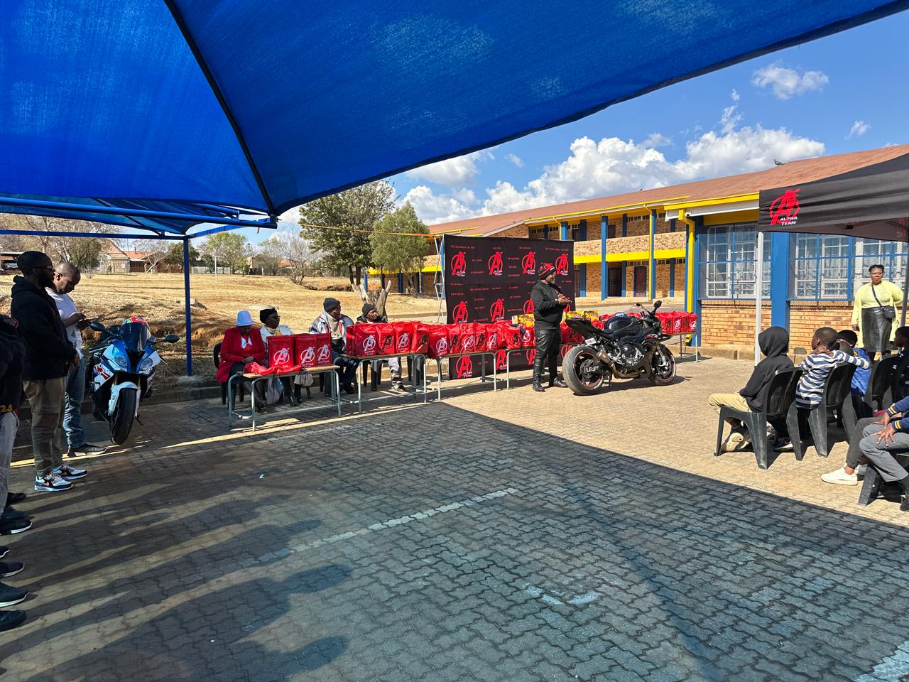 Learners gathered for the hand-over
